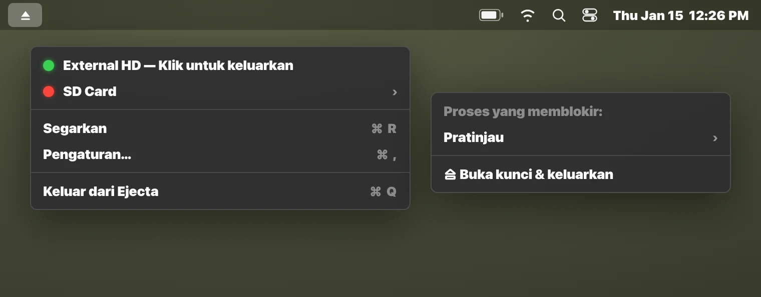Aplikasi Ejecta di bilah menu yang menampilkan proses pemblokir untuk drive eksternal di macOS